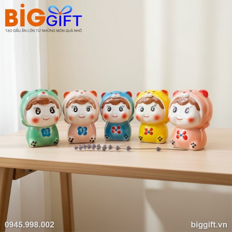 Heo đất b&uacute;p b&ecirc; qu&agrave; tặng in logo nhiều m&agrave;u sắc HĐ04