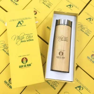 Ảnh nguồn bình tre và hộp vàng Nhịp cầu nhà nông Agritrade Đạm Cà Mau giữ nguyên nhận diện