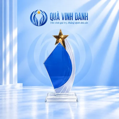 Kỷ niệm chương pha lê mẫu 06 mặt xanh bất đối xứng và sao vàng trên nền Quà Vinh Danh